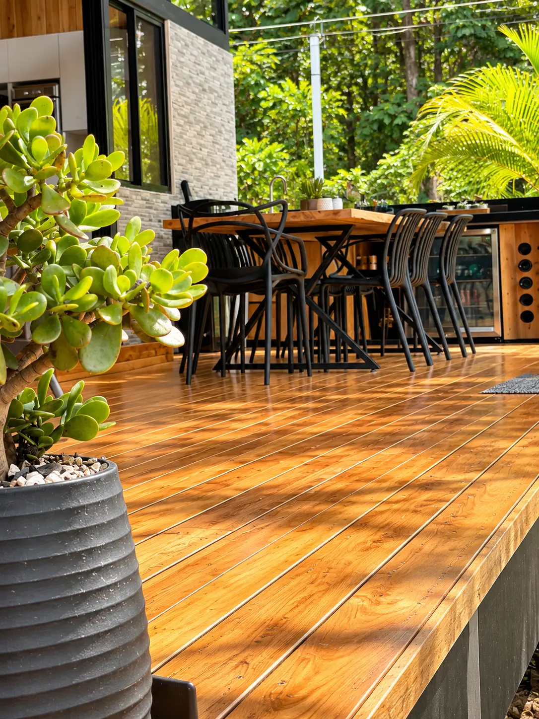 Covered wooden deck and tropical garden